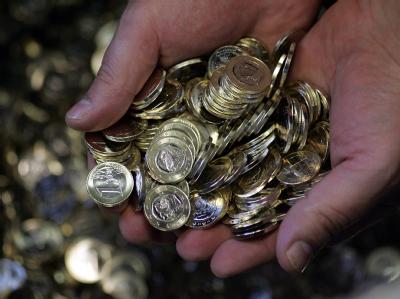 Athen braucht offenbar noch mehr Geld als bisher angenommen. Euro-Münzen