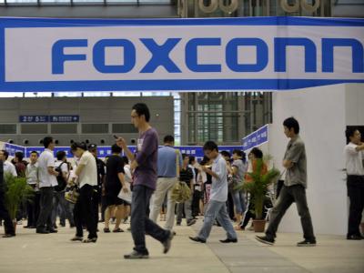 Beim Elektronik-Hersteller Foxconn, hier ein Stand bei einer Jobbörse, gibt es eine Serie von Selbstmorden. Foxconn-Schriftzug