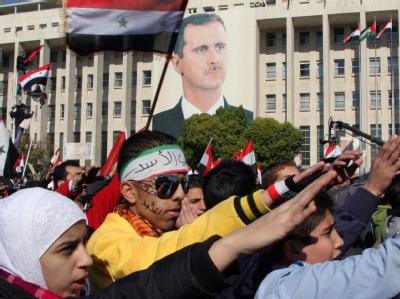 Anhänger des Assad-Regimes bei einer Demonstration in Damaskus. Foto: Youssef Badawi Pro-Assad-Demo
