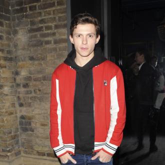 Der Schauspieler hat verraten, er würde zu dem Darsteller und ehemaligen Profi-Wrestler aufblicken. Tom Holland