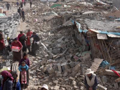 Die Zahl der Toten nach dem Erdbeben in China ist auf mehr als 1100 gestiegen. Trümmerlandschaft