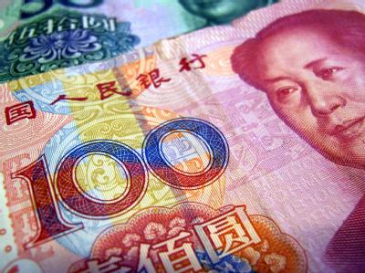 Chinesische Yuan-Scheine mit dem Bild des ehemaligen Parteiführers der kommunistischen Partei Chinas Mao Tse-tung. Yuan-Schein