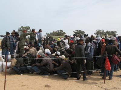 Flüchtlinge aus Libyen in einem Camp an der tunesischen Grenze. Flüchtlinge