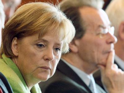 Bundeskanzlerin Angela Merkel (CDU) und SPD-Chef Franz Müntefering. Merkel und Müntefering