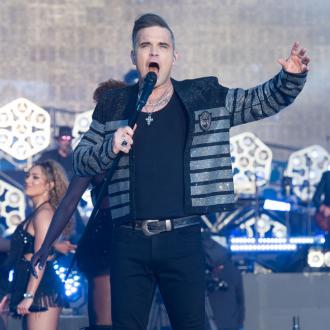 Der Sänger will als Headliner bei dem legendären Festival auftreten. Dabei hat er allerdings ganz genaue Vorstellungen. Robbie Williams