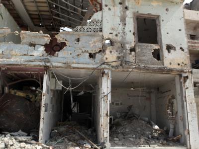 Zerstörungen in Homs: Nach Angaben der Opposition desertieren immer mehr Soldaten der syrischen Regierungstruppen. Foto: Youssef Basawi Zerstörtes Haus in Homs