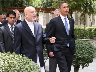 US-Präsident Barack Obama hat Hamid Karsai zu Reformen ermutigt. (Archivbild) Hamid Karsai und Barack Obama