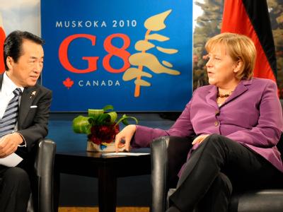 Im Gespräch: Bundeskanzlerin Merkel und der japanische Premierminister Naoto Kan. Merkel und Kan