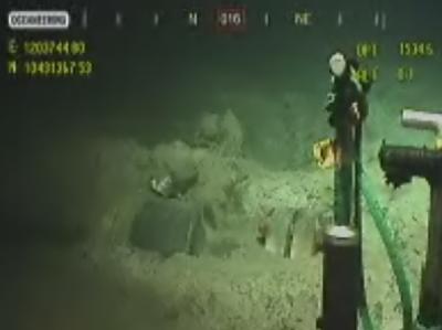 Das Videobild zeigt die Arbeiten am abgedichteten Bohrloch im Golf von Mexiko. Foto: BP/Screenshot/HO «Kill»-Manöver