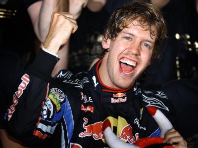 Sebastian Vettel feiert nach seinem Sieg in der Formel-1-Weltmeisterschaft. Formel 1 GP Abu Dhabi - Vettel wird Weltmeister