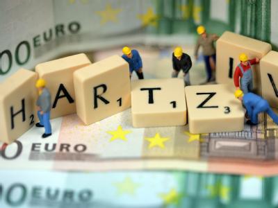 Kanzlerin Merkel hat Forderungen nach einer Erhöhung des Regelsatzes um mehr als fünf Euro zurückgewiesen Hartz-IV-Diskussion
