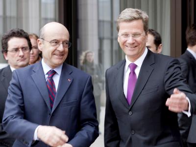 Außenminister Westerwelle und (r) und sein französischer Amtskollege Juppe. Westerwelle und Juppe