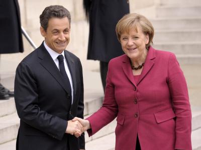 Bundeskanzlerin Merkel bei mit dem französischen Präsidenten Nicolas Sarkozy bei einem Sondergipfel zur UN-Resolution zu einem Flugverbot über Libyen. Merkel und Sarkozy
