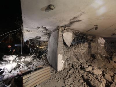 Das zerstörte Haus des Machthabers: Bei dem Nato-Luftangriff wurde der jüngste Sohn al-Gaddafis angeblich getötet. Gaddafi-Sohn bei Nato-Luftschlag auf Tripolis getötet