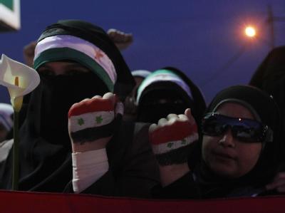 In Jordanien lebende Syrer protestieren in der Hauptstadt Amman gegen den syrischen Präsidenten Baschar al-Assad. Protest gegen Assad