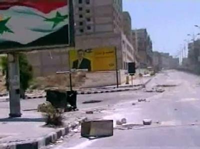 Die Aufnahme der syrischen Nachrichtenagentur SANA zeigt Schäden in der Stadt Hama, angeblich von Kämpfen zwischen Sicherheitskräften und bewaffneten Oppositionellen. Das Blutvergießen geht weiter. Blutvergießen in Syrien geht weiter