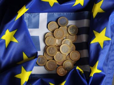 Grünes Licht für die Bundesregierung beim Euro-Rettungsschirm. Euro-Münzen