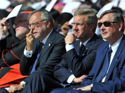 Danilo Türk, Präsident von Slowenien (r-l), Bundespräsident Wulff, Andrea Riccardi, und Kardinal Reinhard Marx bei einer Gedenkfeier zum 10. Jahrestag der Anschläge des 11. September in München. Gedenken 9/11 - Friedenstreffen in München