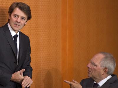 «Sehr offene Aussprache»: Bundesfinanzminister Schäuble und sein französischer Amtskollege Baroin (l). Archivfoto: Johannes Eisele Francois Baroin und Wolfgang Schäuble