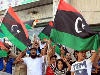 Libyer feiern in Tripolis den Tod Gaddafis. Foto: Sabri Elmhedwi Jubel in Tripolis