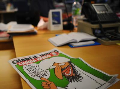 Das «Scharia-Sonderheft» der französischen Satire-Zeitung «Charlie Hebdo». Foto: Martin Bureau Scharia-Sonderheft