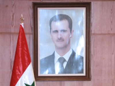 Verblasstes Porträt des syrischen Präsidenten Baschar al-Assad. Foto: Youssef Badawi Assad