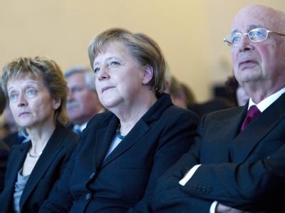 Angela Merkel am ersten Tag des Treffens. Foto: Jean-Christophe Bott Davos 2012
