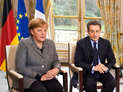 Bundeskanzlerin Angela Merkel und der französische Staatspräsident Nicolas Sarkozy bei einem interview im Elysee Palast in Paris. Foto: Jesco Denzel Merkel und Sarkozy