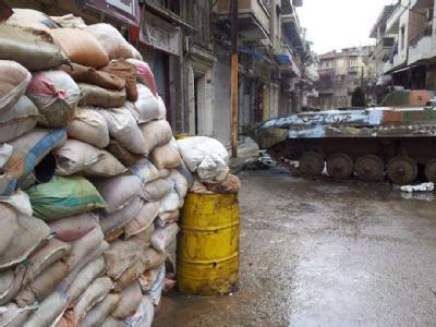 Straßenszene in der syrischen Stadt Holms. Foto: Local Coordination Committees/Archiv Straße in Homs