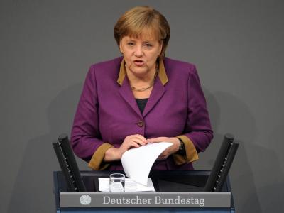 Die fehlende Kanzlermehrheit bei der Griechenland-Abstimmung ist nicht das Ende der Koalition. Merkel ist hart im Nehmen und muss den Euro retten. Mit der FDP hat sie aber noch eine Rechnung offen. Foto: Hannibal Im Bundestag