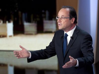 Bundeskanzlerin Angela Merkel und wichtige EU-Partner wollen den französischen Präsidentschaftskandidaten François Hollande im Wahlkampf nicht empfangen. Foto: Fred Dufour Francois Hollande