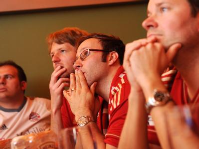 Fußballfans verfolgen in München das Champions League-Halbfinale. Foto: Tobias Hase Fans in München