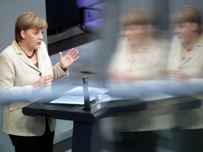 Bundeskanzlerin Angela Merkel (CDU) gibt ihre Regierungserklärung zu den bevorstehenden Gipfeltreffen führender Industrienationen und der Nato in den USA ab. Foto: Wolfgang Kumm Bundestag