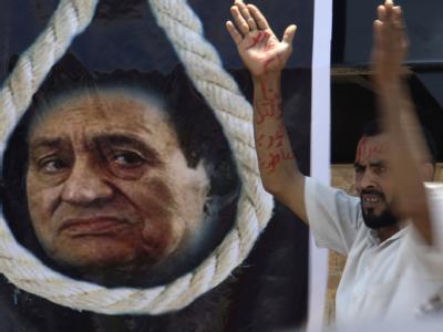 Bei der Präsidentenwahl vergangene Woche blieb etwa die Hälfte der Wähler zu Hause. Doch zu dem Prozess gegen Ex-Präsident Husni Mubarak hat fast jeder Ägypter eine Meinung. Foto: Amel Pain Mubarak-Prozess