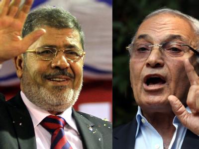 Bei der Stichwahl können sich die Ägypter zwischen Ahmed Schafik (r), einem Vertreter des alten Regimes, und Mohammed Mursi (l), einem Islamisten, entscheiden. Foto: Khaled Elfiqi Stichwahl in Ägypten