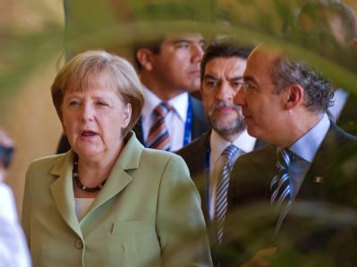 Bundeskanzlerin Angela Merkel und der mexikanische Präsident Felipe Calderon beim G20-Gipfel. Foto: Peer Grimm Merkel und Calderon