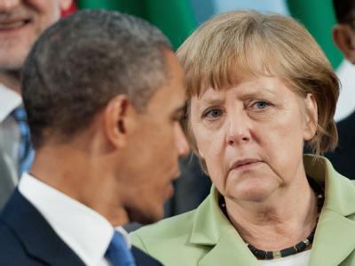 US-Präsident Barack Obama und Bundeskanzlerin Angela Merkel unterhalten sich auf dem G20-Gipfel im mexikanischen in Los Cabos. Foto: Peer Grimm G20-Gipfel