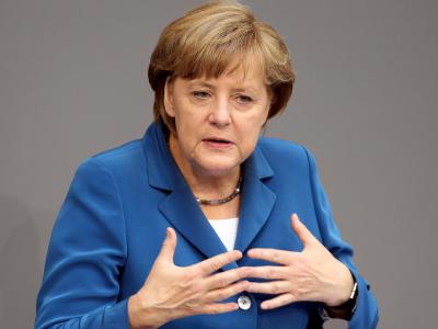 Bundeskanzlerin Angela Merkel spricht im Bundestag in Berlin. Foto: Wolfgang Kumm Merkel