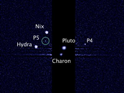 Das Hubble-Foto zeigt im Kreis den neu entdeckten fünften Pluto-Mond. Foto: NASA Neuer Pluto-Mond