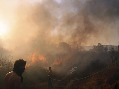 Bewohner des Dorfes Molinaseca in der nordspanischen Provinz Leon kämpfen gegen die Waldbrände an. Foto: Ana Barredo Waldbrände im nordspanischen Molinaseca