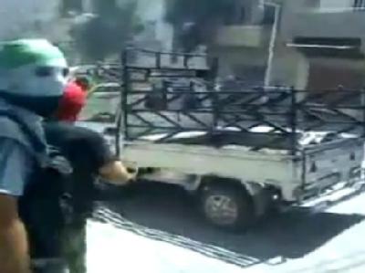 Der Video-Grab zeigt angeblich Kämpfer der Freien Syrischen Armee nahe Damaskus. Foto: Shaam News Network Kämpfer in Syrien