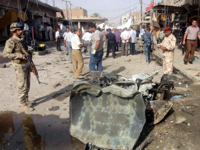 Explodierte Autobombe im südirakischen Najaf: Zu Beginn des Fastenmonats Ramadan wird der Irak von einer blutigen Anschlagswelle erschüttert. Foto: Khider Abbas Explodierte Autobombe in Najaf
