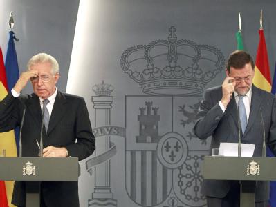 Ratlos ob der Äußerungen von EZB-Präsident Mario Draghi: Die Ministerpräsidenten Mario Monti (Italien) und Mariano Rajoy (Spanien). Foto: Manuel H. de Leon Monti und Rajoy