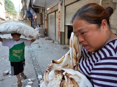 Eine Überlebende des Erdbebens in China. Foto: San Yu Erdbebenopfer in China