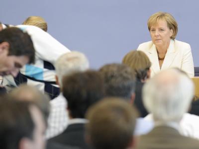 Entschlossener Blick: Bundeskanzlerin Angela Merkel in der Bundespressekonferenz. Kanzlerin Merkel