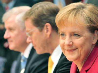 Nach der Einigung: Horst Seehofer, Guido Westerwelle und Angela Merkel. Merkel, Westerwelle und Seehofer