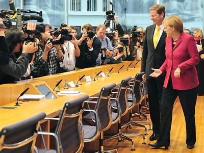 Sie gehen Erfolge verkaufen: FDP-Chef Guido Westerwelle und Bundeskanzlerin Angela Merkel. Merkel und Westerwelle