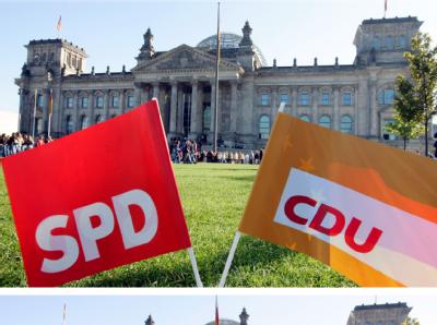Symbol der großen Koalition: Fähnchen von SPD und CDU vor dem Reichstagsgebäude. Eine große Koalition findet derzeit die meiste Sympathie. Große Koalition