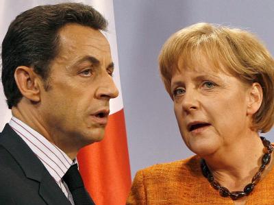 Fordern von Griechenland die zugesagten Reformen bedingungslos umzusetzen: Frankreichs Präsident Sarkozy und Kanzlerin Merkel. Foto: Daniel Karmann/Archiv Merkel und Sarkozy