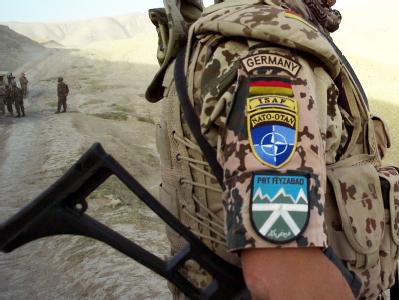 Deutscher Bundeswehr-Soldat im NATO-Einsatz in Afghanistan: Ein vollständiger Abzug bis 2014 ist unwahrscheinlich. Bundeswehr-Soldat in Afghanistan